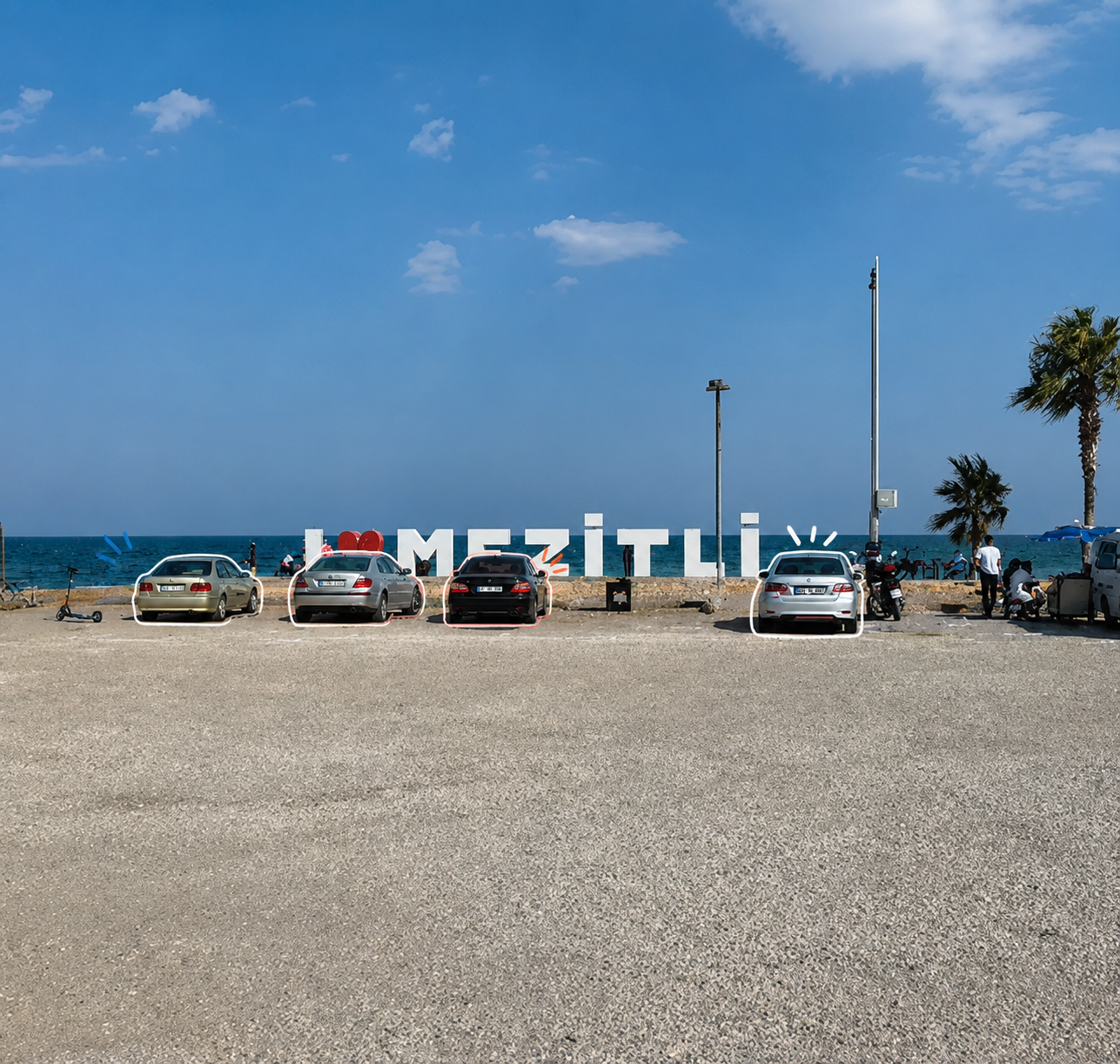 Paddleboarding at Soli Pompeiopolis Wide seafront car park with the I love Mezitli sign and the Mediterranean behind at Soli Pompeiopolis