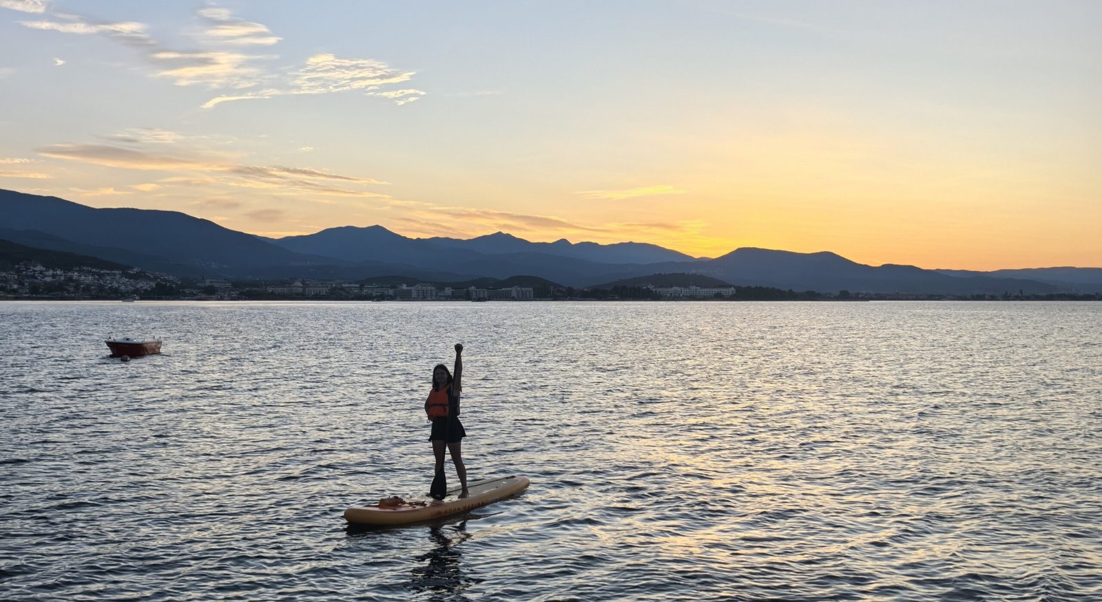 What to Wear Paddleboarding Sunrise paddleboarding session on Turkey's Aegean coast